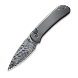 We Knife - Qubit Damasteel, Polished Orange Peel Textured Ti